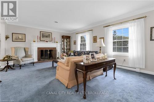 63 Mountain Street, St. Catharines (460 - Burleigh Hill), ON - Indoor Photo Showing Living Room With Fireplace