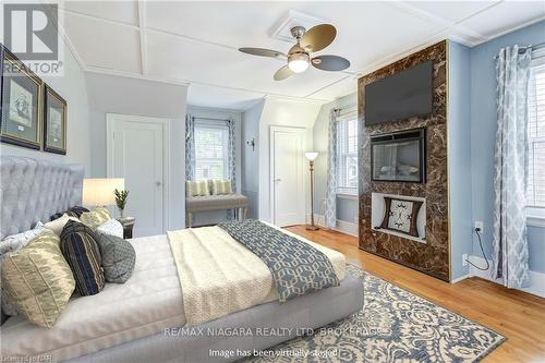 6 Highland Gardens, Welland (769 - Prince Charles), ON - Indoor Photo Showing Bedroom With Fireplace