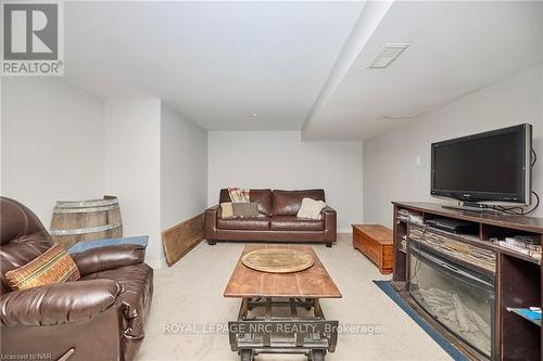 12 Corbett Avenue, St. Catharines (438 - Port Dalhousie), ON - Indoor Photo Showing Living Room With Fireplace