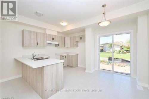 23 - 397 Garrison Road, Fort Erie (333 - Lakeshore), ON - Indoor Photo Showing Kitchen With Double Sink