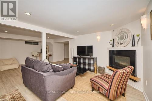 2459 Noella Crescent, Niagara Falls (207 - Casey), ON - Indoor Photo Showing Living Room With Fireplace