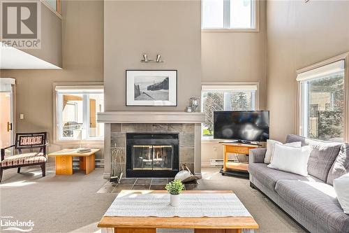 204 - 169 Jozo Weider Boulevard, Blue Mountains (Blue Mountain Resort Area), ON - Indoor Photo Showing Living Room With Fireplace