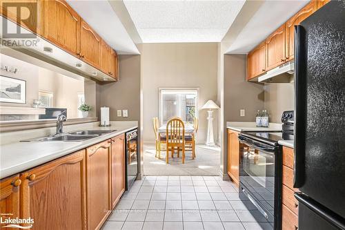 204 - 169 Jozo Weider Boulevard, Blue Mountains (Blue Mountain Resort Area), ON - Indoor Photo Showing Kitchen With Double Sink