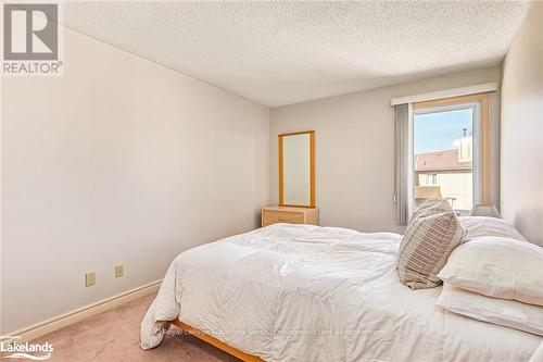 204 - 169 Jozo Weider Boulevard, Blue Mountains (Blue Mountain Resort Area), ON - Indoor Photo Showing Bedroom