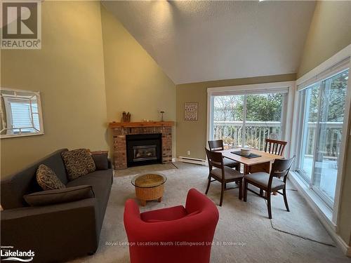 160 - 51 Trott Boulevard, Collingwood, ON - Indoor Photo Showing Living Room With Fireplace