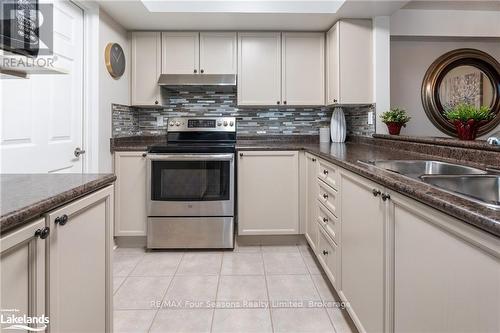 A405 - 216 Plains Road W, Burlington (Bayview), ON - Indoor Photo Showing Kitchen With Double Sink