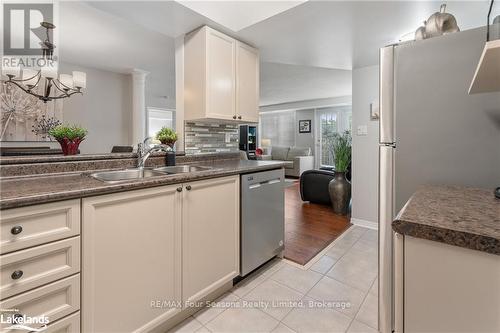 A405 - 216 Plains Road W, Burlington (Bayview), ON - Indoor Photo Showing Kitchen With Double Sink