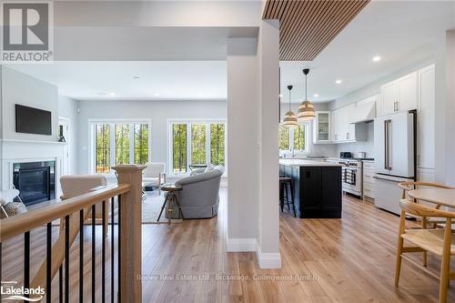 104 Black Willow Crescent, Blue Mountains (Blue Mountain Resort Area), ON - Indoor Photo Showing Kitchen With Fireplace