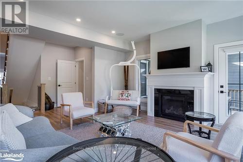 104 Black Willow Crescent, Blue Mountains (Blue Mountain Resort Area), ON - Indoor Photo Showing Living Room With Fireplace