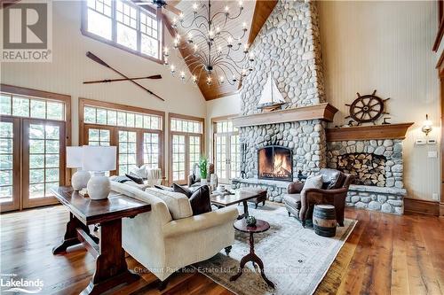 1902 Foxpoint Road, Lake Of Bays (Franklin), ON - Indoor Photo Showing Living Room With Fireplace