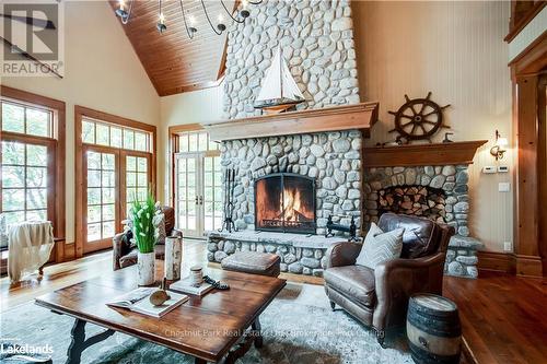 1902 Foxpoint Road, Lake Of Bays (Franklin), ON - Indoor Photo Showing Living Room With Fireplace