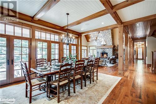 1902 Foxpoint Road, Lake Of Bays (Franklin), ON - Indoor Photo Showing Dining Room With Fireplace