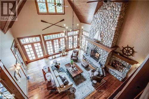 1902 Foxpoint Road, Lake Of Bays (Franklin), ON - Indoor Photo Showing Other Room With Fireplace