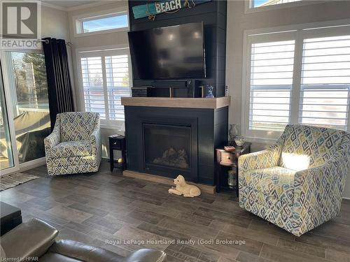 Lot 91 - 77683 Bluewater, Central Huron (Bayfield), ON - Indoor Photo Showing Living Room With Fireplace