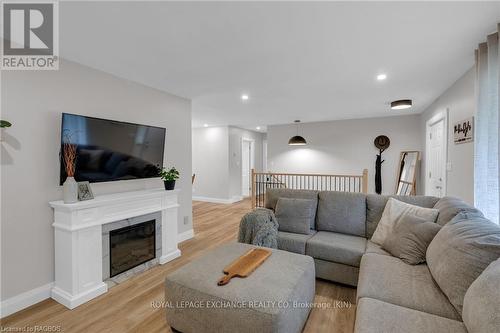 386 Mechanics Street, Huron East (Brussels), ON - Indoor Photo Showing Living Room With Fireplace