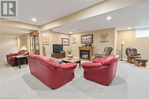 414 4Th Street S, Hanover, ON - Indoor Photo Showing Basement With Fireplace