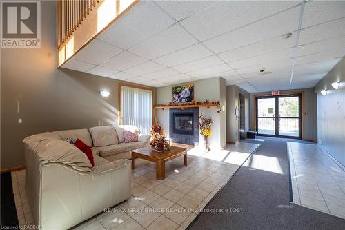 209 - 1775 9Th Avenue E, Owen Sound, ON - Indoor Photo Showing Other Room With Fireplace