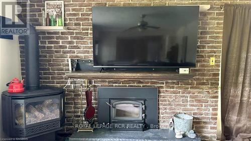 25 Avele Road, South Bruce Peninsula, ON - Indoor Photo Showing Living Room With Fireplace