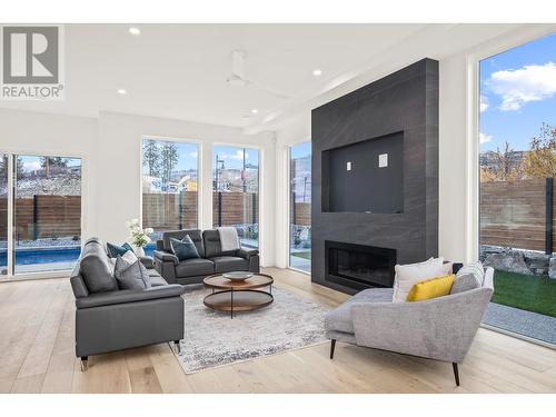 4983 Bucktail Lane, Kelowna, BC - Indoor Photo Showing Living Room With Fireplace