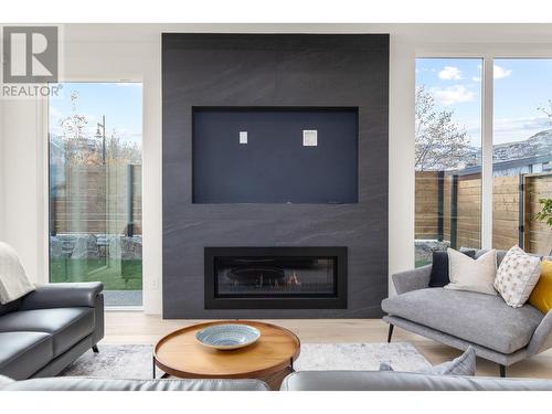 4983 Bucktail Lane, Kelowna, BC - Indoor Photo Showing Living Room With Fireplace