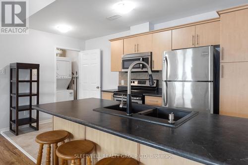 106 Sternes S, Ottawa, ON - Indoor Photo Showing Kitchen With Stainless Steel Kitchen With Double Sink