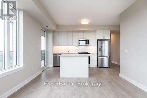 1904 - 3220 William Coltson Avenue, Oakville, ON - Indoor Photo Showing Kitchen With Stainless Steel Kitchen With Upgraded Kitchen