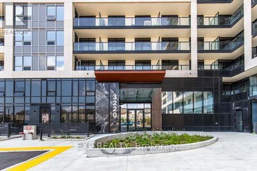 1904 - 3220 William Coltson Avenue, Oakville, ON - Outdoor With Balcony With Facade