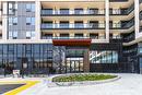 1904 - 3220 William Coltson Avenue, Oakville, ON  - Outdoor With Balcony With Facade 