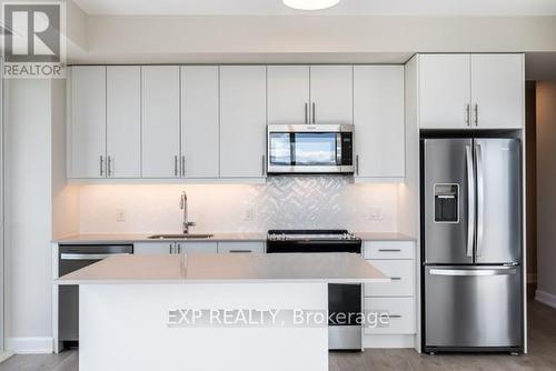 1904 - 3220 William Coltson Avenue, Oakville, ON - Indoor Photo Showing Kitchen With Stainless Steel Kitchen With Upgraded Kitchen