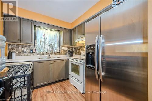 400 Starwood Drive, Guelph (Grange Hill East), ON - Indoor Photo Showing Kitchen With Double Sink