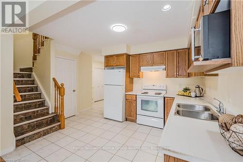 79 Severn Drive, Guelph (Grange Hill East), ON - Indoor Photo Showing Kitchen With Double Sink