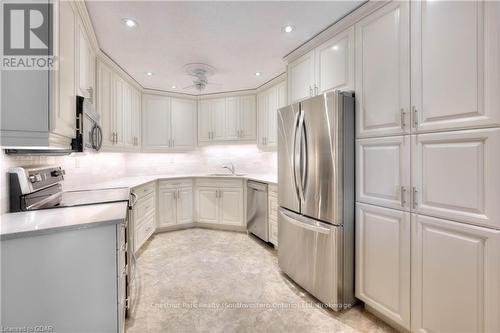 404 - 24 Marilyn Drive, Guelph (Waverley), ON - Indoor Photo Showing Kitchen With Upgraded Kitchen