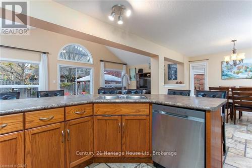 7 Washburn Drive, Guelph (Grange Hill East), ON - Indoor Photo Showing Kitchen With Double Sink