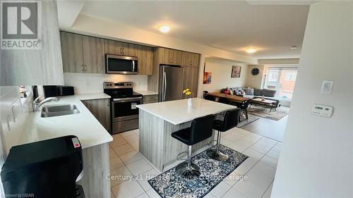 216 Law Drive, Guelph (Grange Hill East), ON - Indoor Photo Showing Kitchen With Double Sink With Upgraded Kitchen