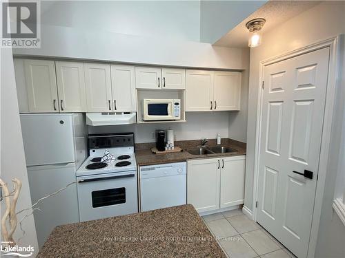 516 - 796468 Grey Road 19, Blue Mountains (Blue Mountain Resort Area), ON - Indoor Photo Showing Kitchen With Double Sink