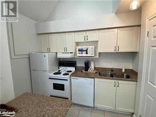 516 - 796468 Grey Road 19, Blue Mountains (Blue Mountain Resort Area), ON - Indoor Photo Showing Kitchen With Double Sink