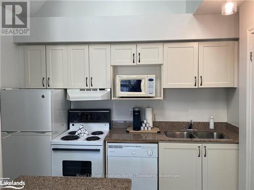 516 - 796468 Grey Road 19, Blue Mountains (Blue Mountain Resort Area), ON - Indoor Photo Showing Kitchen With Double Sink