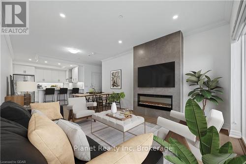 808 - 1878 Gordon Street, Guelph (Guelph South), ON - Indoor Photo Showing Living Room With Fireplace