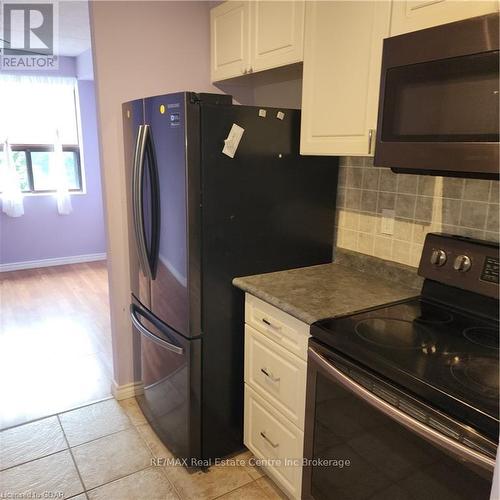 307 - 65 Silvercreek Parkway N, Guelph (Onward Willow), ON - Indoor Photo Showing Kitchen