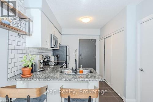 801 - 53 Arthur Street S, Guelph (Two Rivers), ON - Indoor Photo Showing Kitchen With Double Sink With Upgraded Kitchen