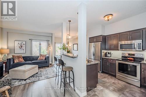 13 - 146 Downey Road, Guelph (Kortright Hills), ON - Indoor Photo Showing Kitchen With Stainless Steel Kitchen