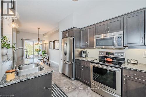 13 - 146 Downey Road, Guelph (Kortright Hills), ON - Indoor Photo Showing Kitchen With Stainless Steel Kitchen With Double Sink