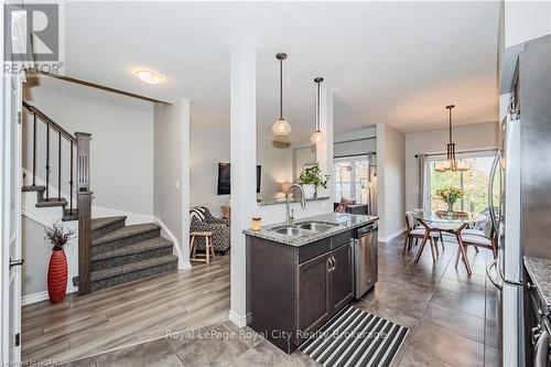 13 - 146 Downey Road, Guelph (Kortright Hills), ON - Indoor Photo Showing Kitchen With Double Sink