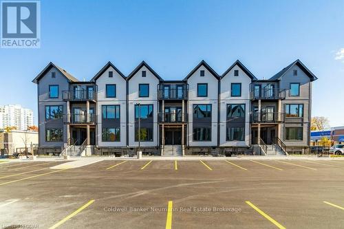 113 - 708 Woolwich Street, Guelph (Northwest Industrial Park), ON - Outdoor With Facade