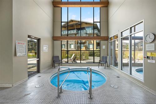 107-4380 Lakeshore Road, Kelowna, BC - Indoor Photo Showing Other Room With In Ground Pool