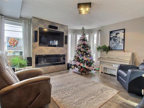 Living room - 443 12E Rue O., La Guadeloupe, QC - Indoor Photo Showing Living Room With Fireplace