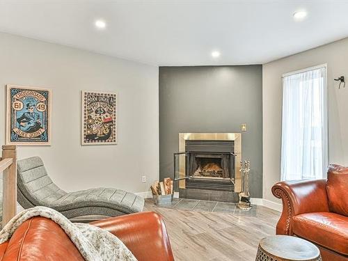 Living room - 2070 Rue Wilfrid, Val-David, QC - Indoor Photo Showing Living Room With Fireplace