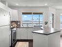 103-3156 Island Hwy West, Qualicum Beach, BC  - Indoor Photo Showing Kitchen With Double Sink 