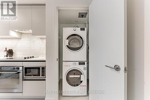 312 - 55 Mercer Street, Toronto, ON -  Photo Showing Laundry Room