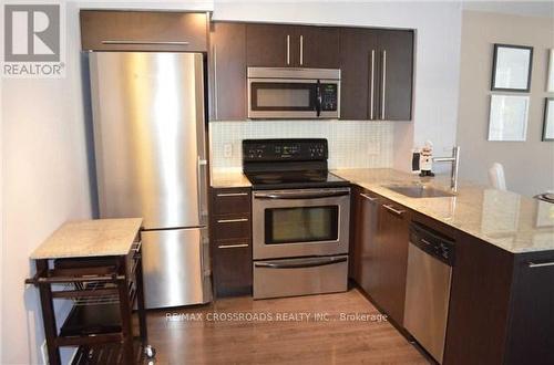 502 - 23 Sheppard Avenue E, Toronto, ON - Indoor Photo Showing Kitchen With Stainless Steel Kitchen